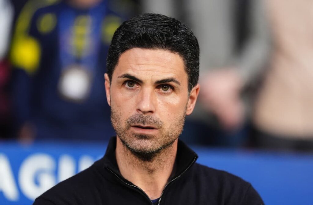 Mikel Arteta looking focused on the touchline during an Arsenal match