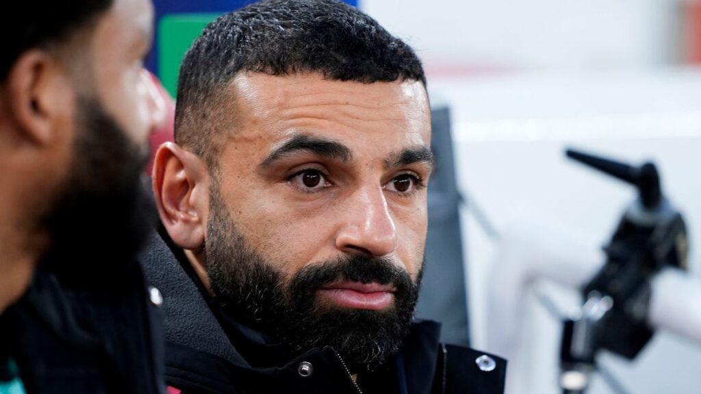 Liverpool forward Mohamed Salah looking disappointed on the football pitch
