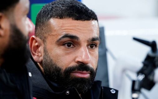 Liverpool forward Mohamed Salah looking disappointed on the football pitch