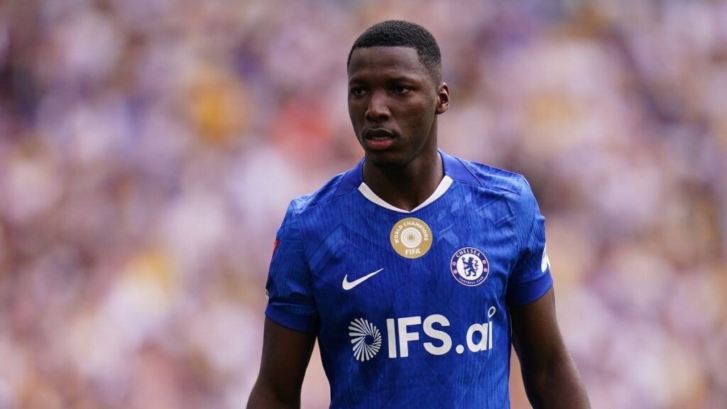 Moises Caicedo playing for Ecuador in a yellow national team jersey