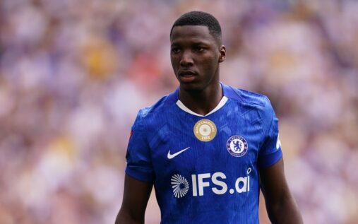 Moises Caicedo playing for Ecuador in a yellow national team jersey