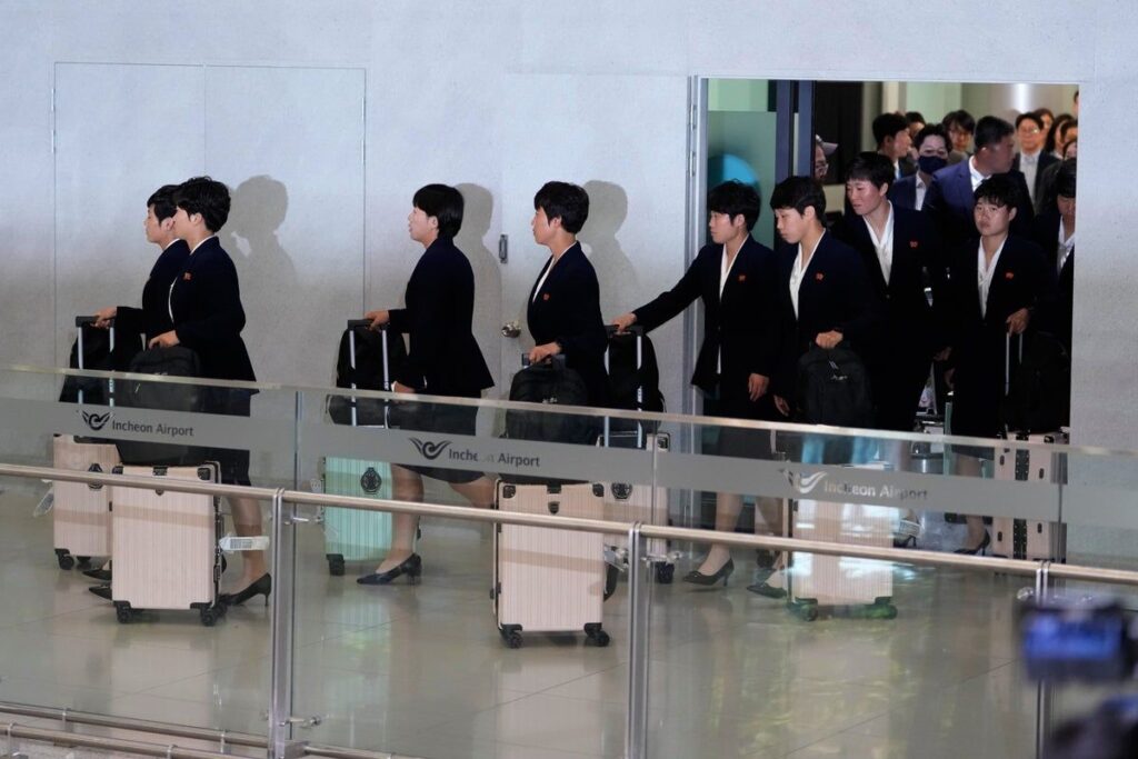 North Korean women's football team players arriving at Incheon International Airport in South Korea