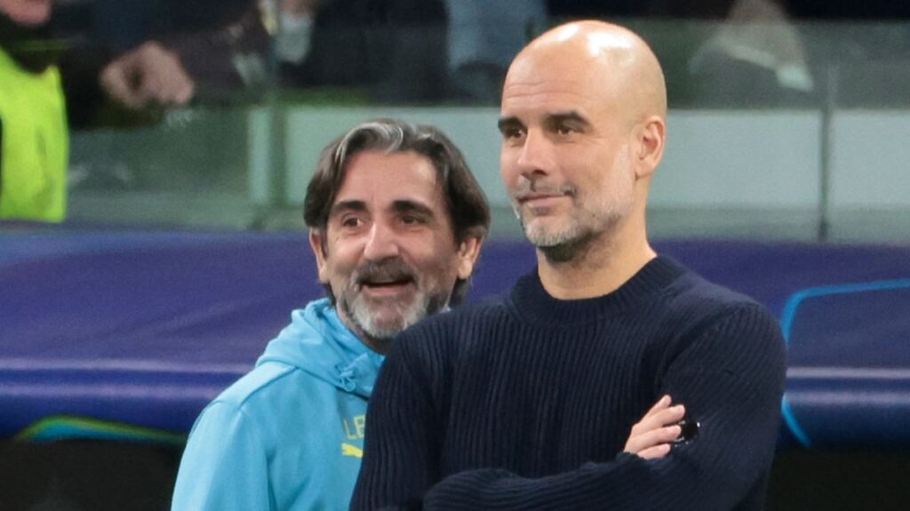 Manchester City manager Pep Guardiola looking thoughtful on the touchline during a match