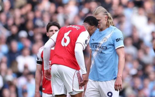 Arsenal defender Gabriel Magalhaes squaring up to Manchester City striker Erling Haaland