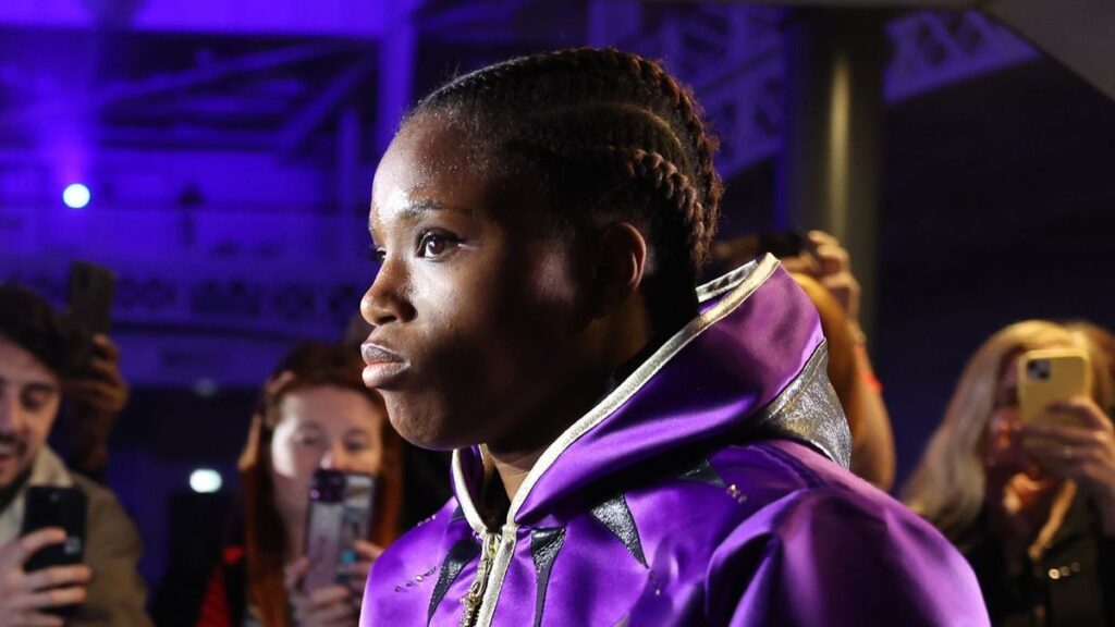 Caroline Dubois celebrating a victory in the boxing ring