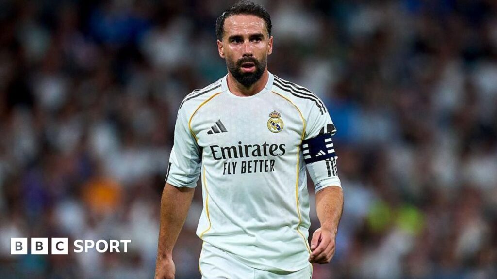 Dani Carvajal waving to Real Madrid supporters at the Santiago Bernabeu