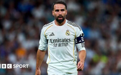 Dani Carvajal waving to Real Madrid supporters at the Santiago Bernabeu