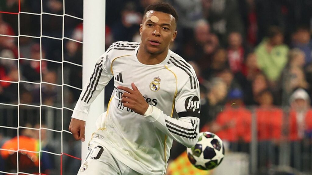 Kylian Mbappe in a Real Madrid kit looking focused ahead of a match