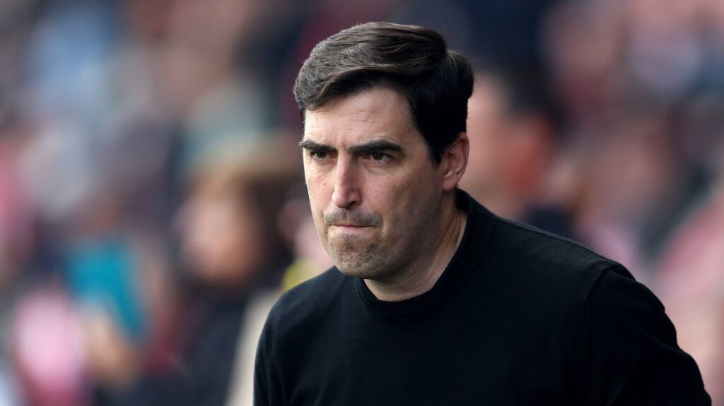 Roy Keane looking thoughtful while speaking as a pundit for Sky Sports