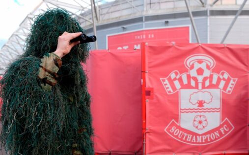 Dejected Southampton fans looking frustrated in the stands during a Championship football match