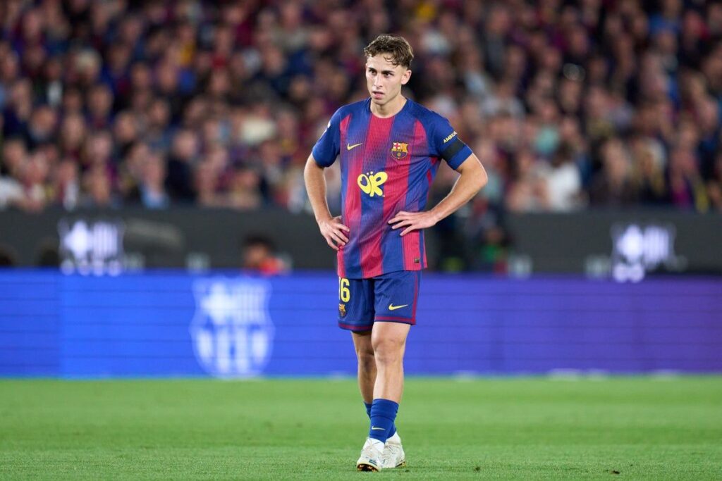 Spain and Barcelona midfielder Fermin Lopez looking dejected on the football pitch