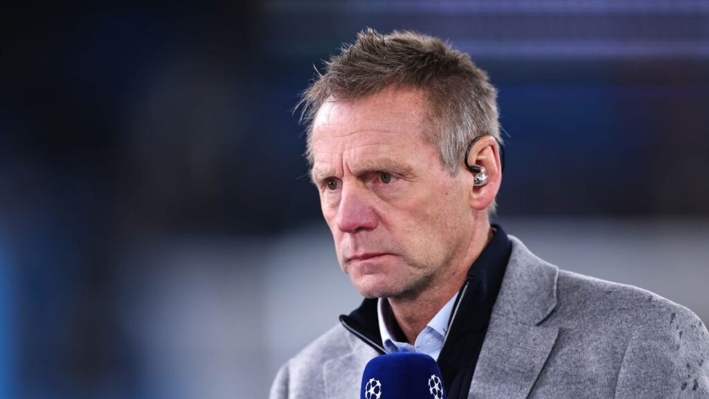 Stuart Pearce watching a Premier League match from the touchline