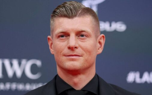 Toni Kroos looking serious while standing on a football pitch