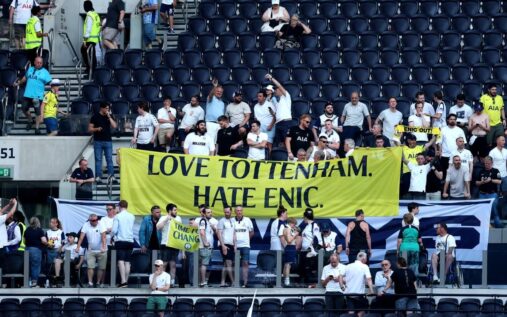 Tottenham Hotspur fans holding protest banners against ENIC ownership in the stadium stands