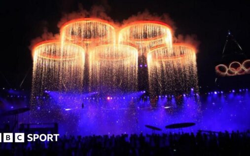 The Olympic rings displayed prominently at a stadium ahead of a major international sporting event