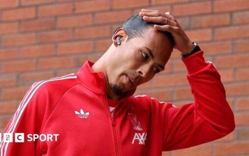 Liverpool captain Virgil van Dijk looking dejected on the pitch