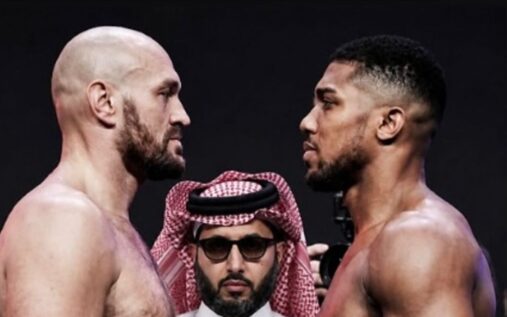 Anthony Joshua looking focused while standing in a boxing ring