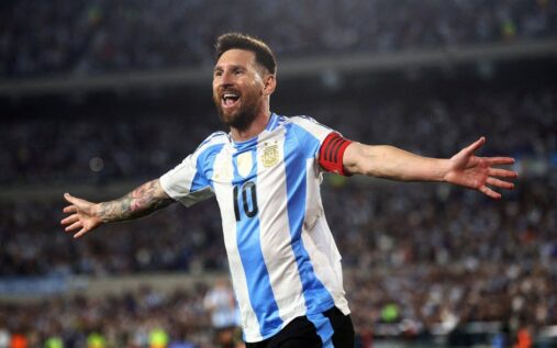 Lionel Messi wearing the Argentina national team kit on the pitch