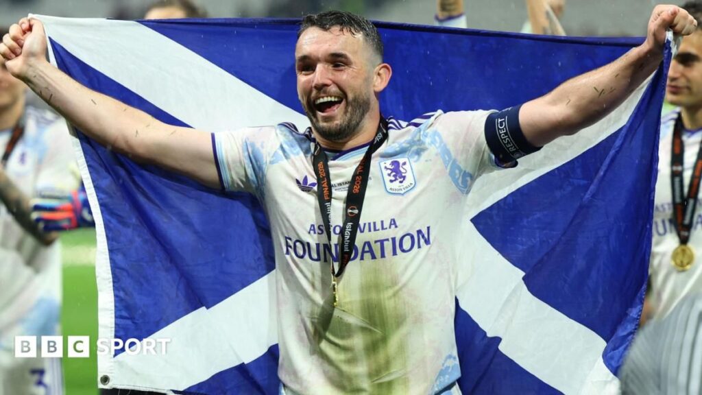 Scotland midfielder John McGinn celebrating during an international football match