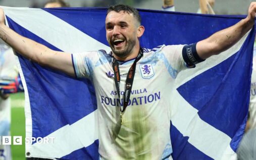 Scotland midfielder John McGinn celebrating during an international football match