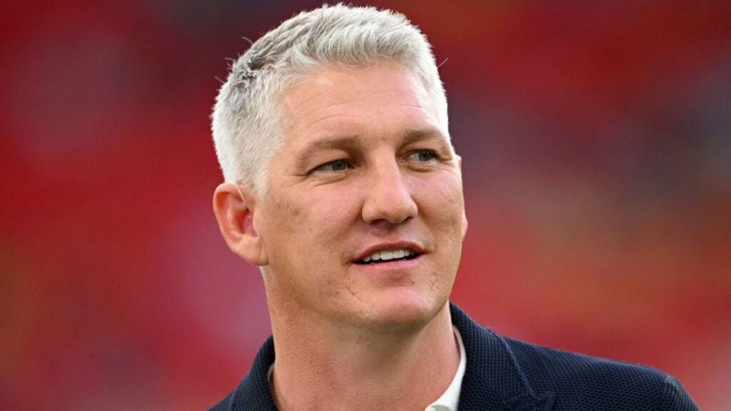 Bastian Schweinsteiger speaking into a microphone while working as a television pundit at the 2026 World Cup