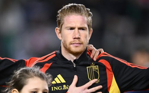 Kevin de Bruyne and Romelu Lukaku lining up for the Belgium national team during a World Cup match