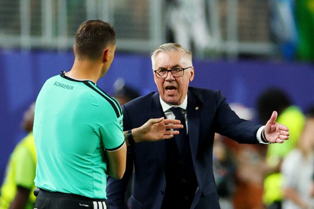 Carlo Ancelotti looking thoughtful on the touchline while managing the Brazil national football team