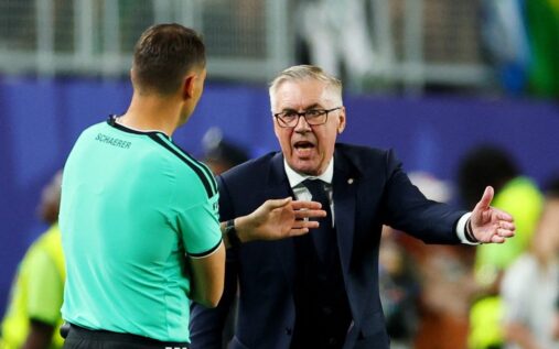 Carlo Ancelotti looking thoughtful on the touchline while managing the Brazil national football team