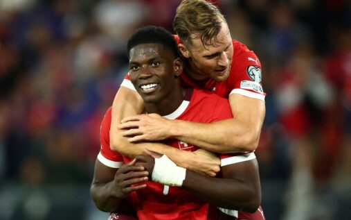 Switzerland striker Breel Embolo in action wearing his national team kit