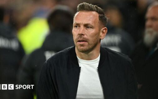 Wales manager Craig Bellamy gesturing on the touchline during an international football match