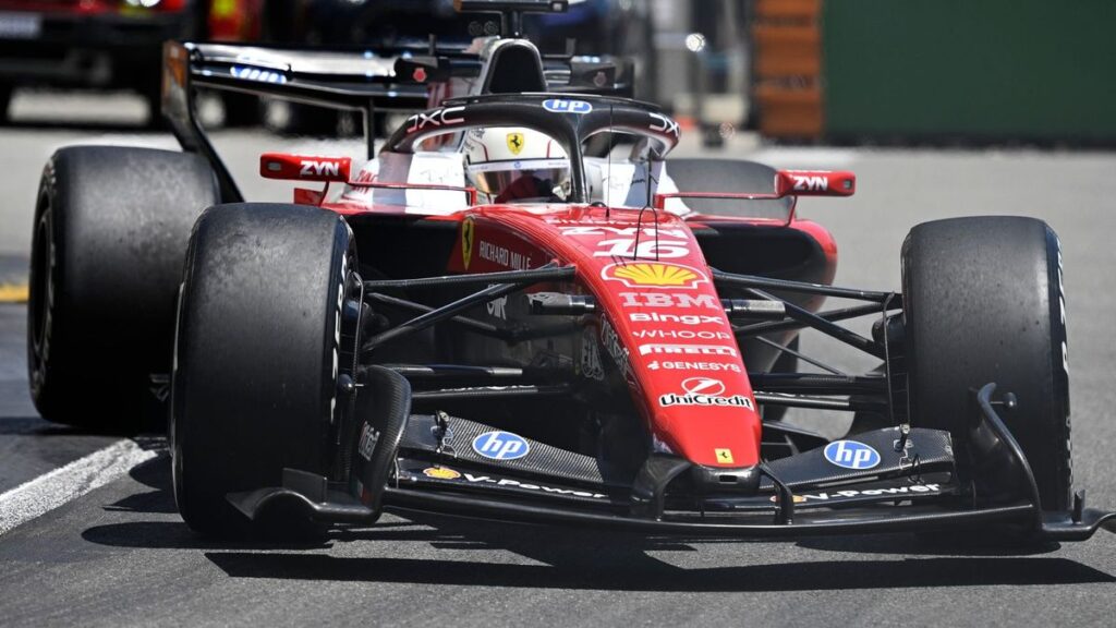 Charles Leclerc driving his Ferrari around the street circuit during the Monaco Grand Prix