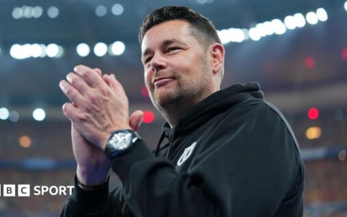 Lens manager Pierre Sage directing his team from the touchline during a football match