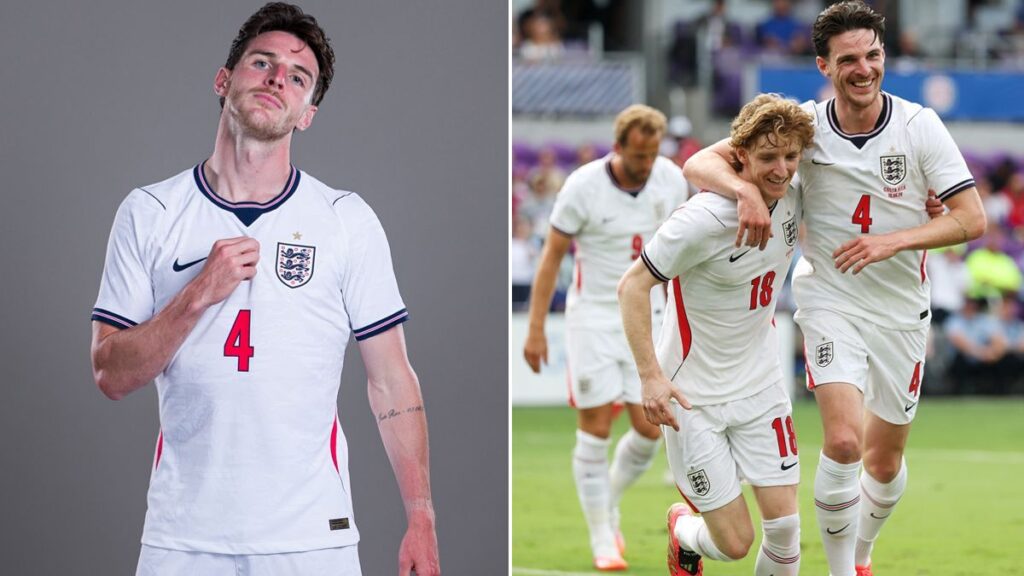 Declan Rice wearing an England training shirt squinting in the bright Florida sunshine