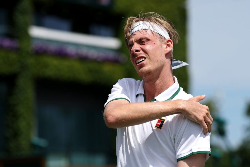 Denis Shapovalov receiving medical treatment on his shoulder on Court 6 at Wimbledon