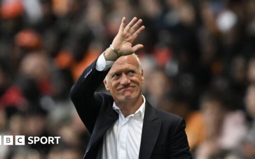 Didier Deschamps waving to France supporters on the touchline