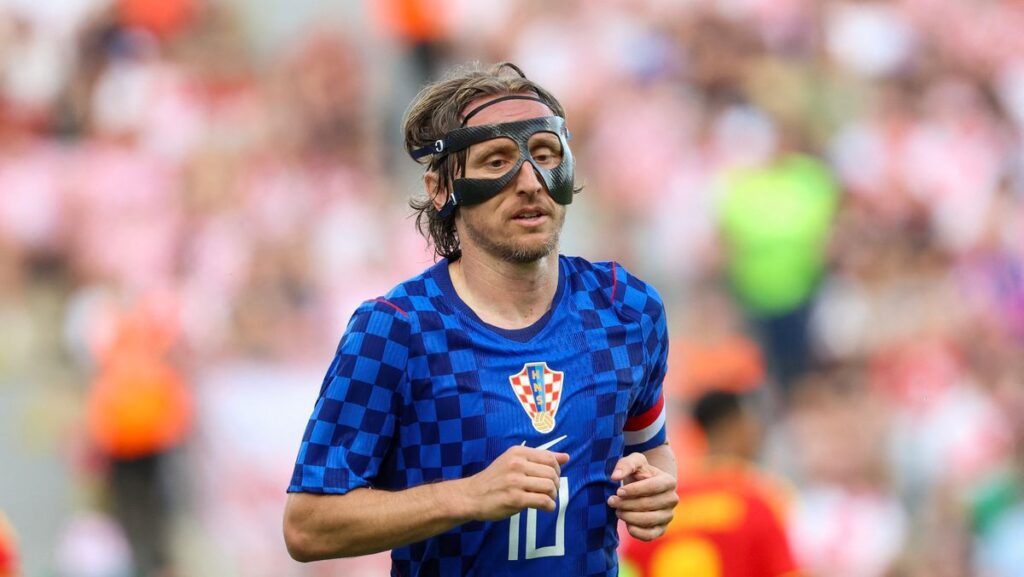Luka Modric playing for the Croatia national team in his iconic checkered kit