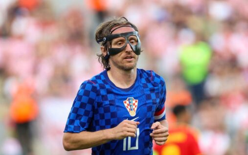 Luka Modric playing for the Croatia national team in his iconic checkered kit