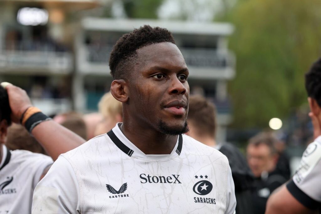 Maro Itoje looking focused in his England Rugby kit during an international match