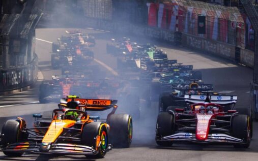 Esteban Ocon and Oliver Bearman driving Haas Formula 1 cars on the Monaco Grand Prix street circuit.