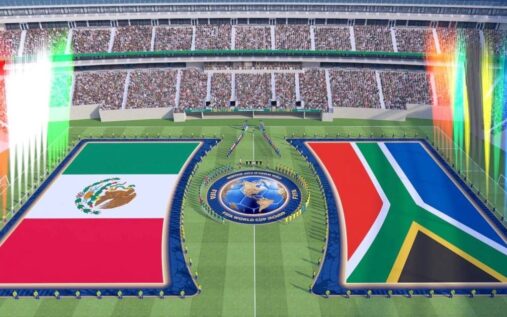 A wide view of the Estadio Azteca pitch prepared for a pre-match ceremony with large curved national flags