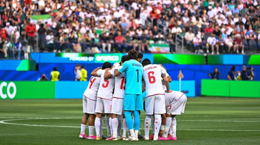 Iran national football team head coach Amir Ghalenoei gesturing on the touchline