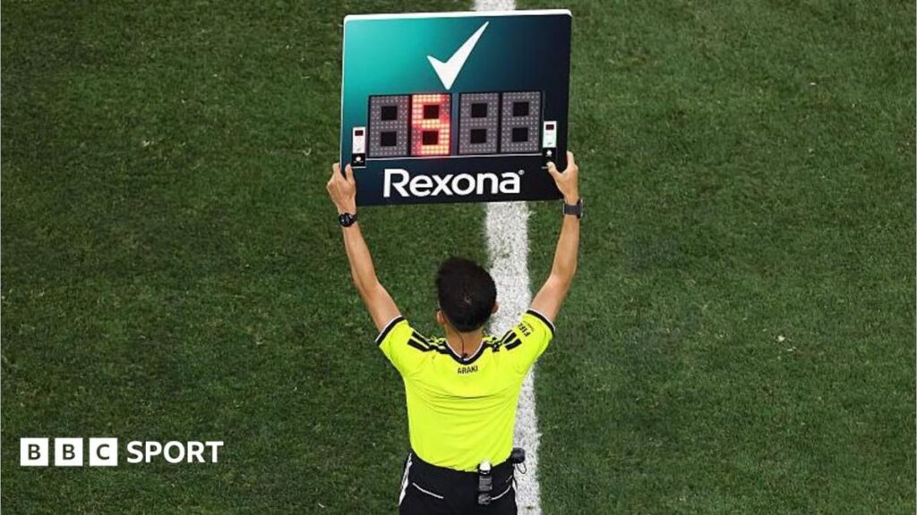 Pierluigi Collina observing a 2026 World Cup match from the touchline