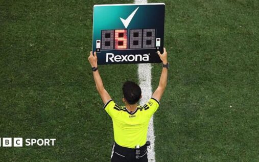 Pierluigi Collina observing a 2026 World Cup match from the touchline