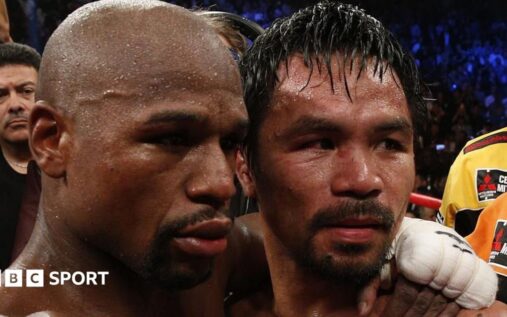 Manny Pacquiao and Floyd Mayweather standing face-to-face inside a boxing ring