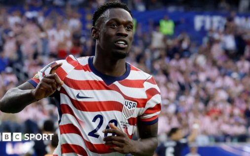 United States striker Folarin Balogun celebrating a goal at the World Cup