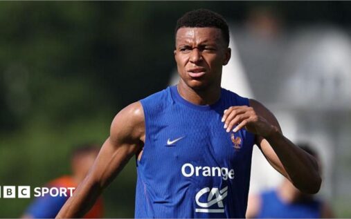 Kylian Mbappe pointing and issuing instructions while playing for the France national team
