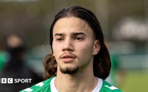 Portrait of French footballer Kenzo Kies wearing a Guingamp kit