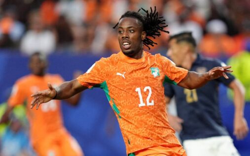 Elye Wahi playing for Ivory Coast during a competitive international football match