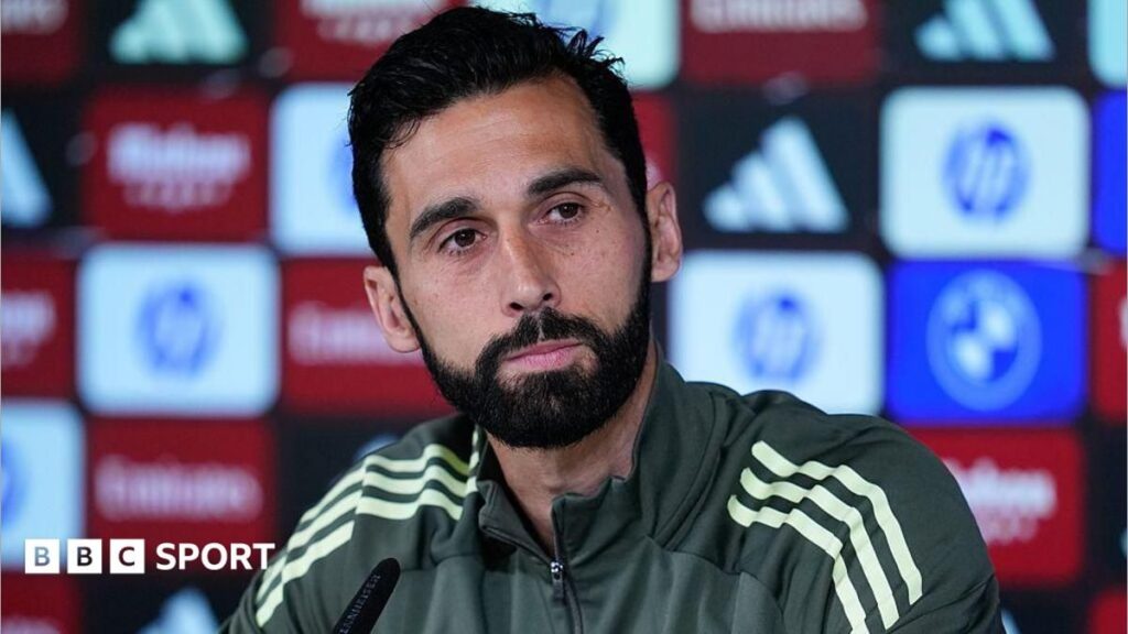 Alvaro Arbeloa standing on the touchline during a football match