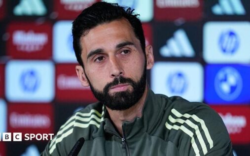 Alvaro Arbeloa standing on the touchline during a football match